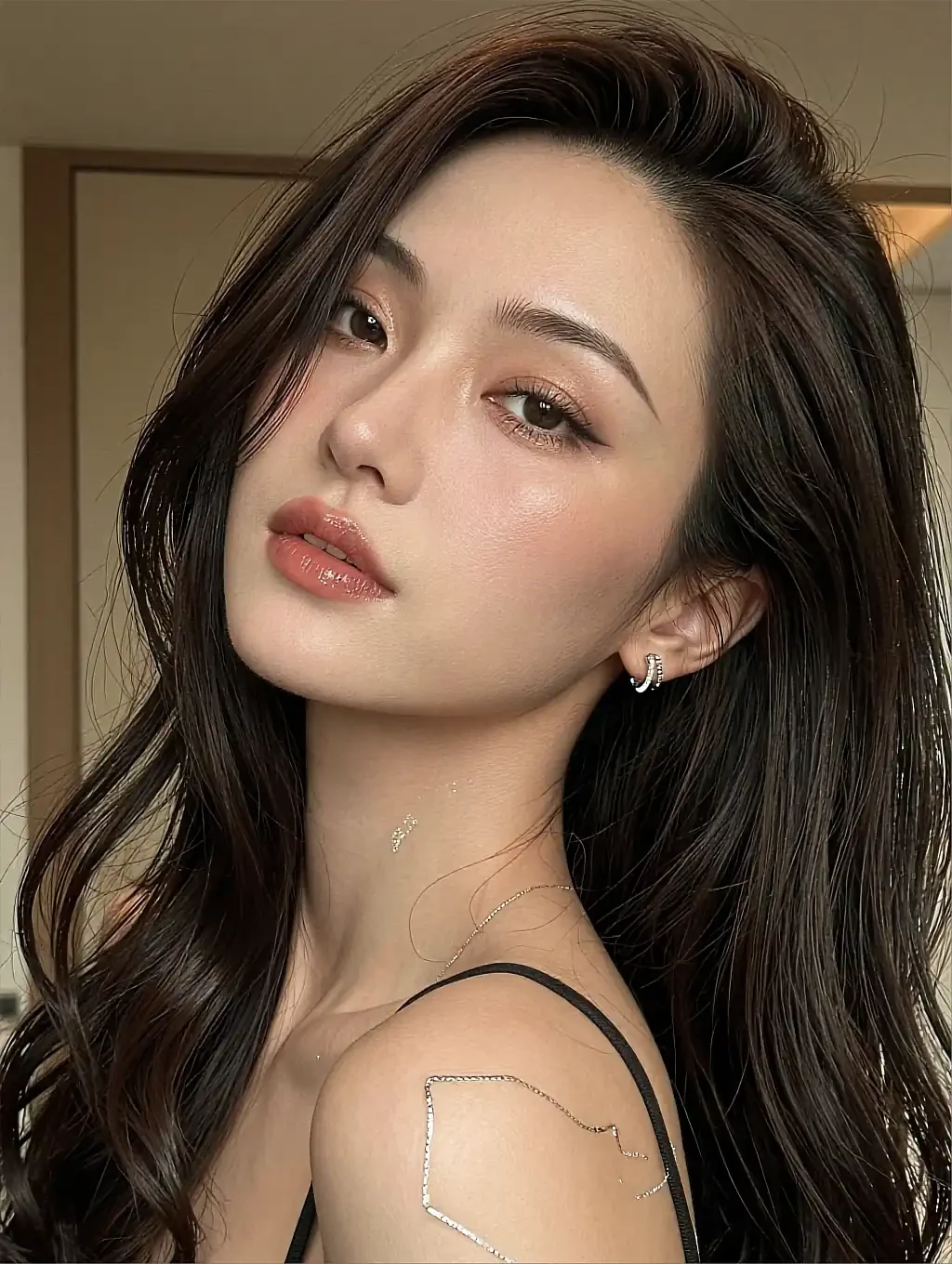 Fictional AI character with wavy hair in warm, glamorous light